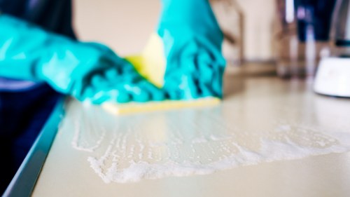 Professional cleaners working in a Wandsworth retail space